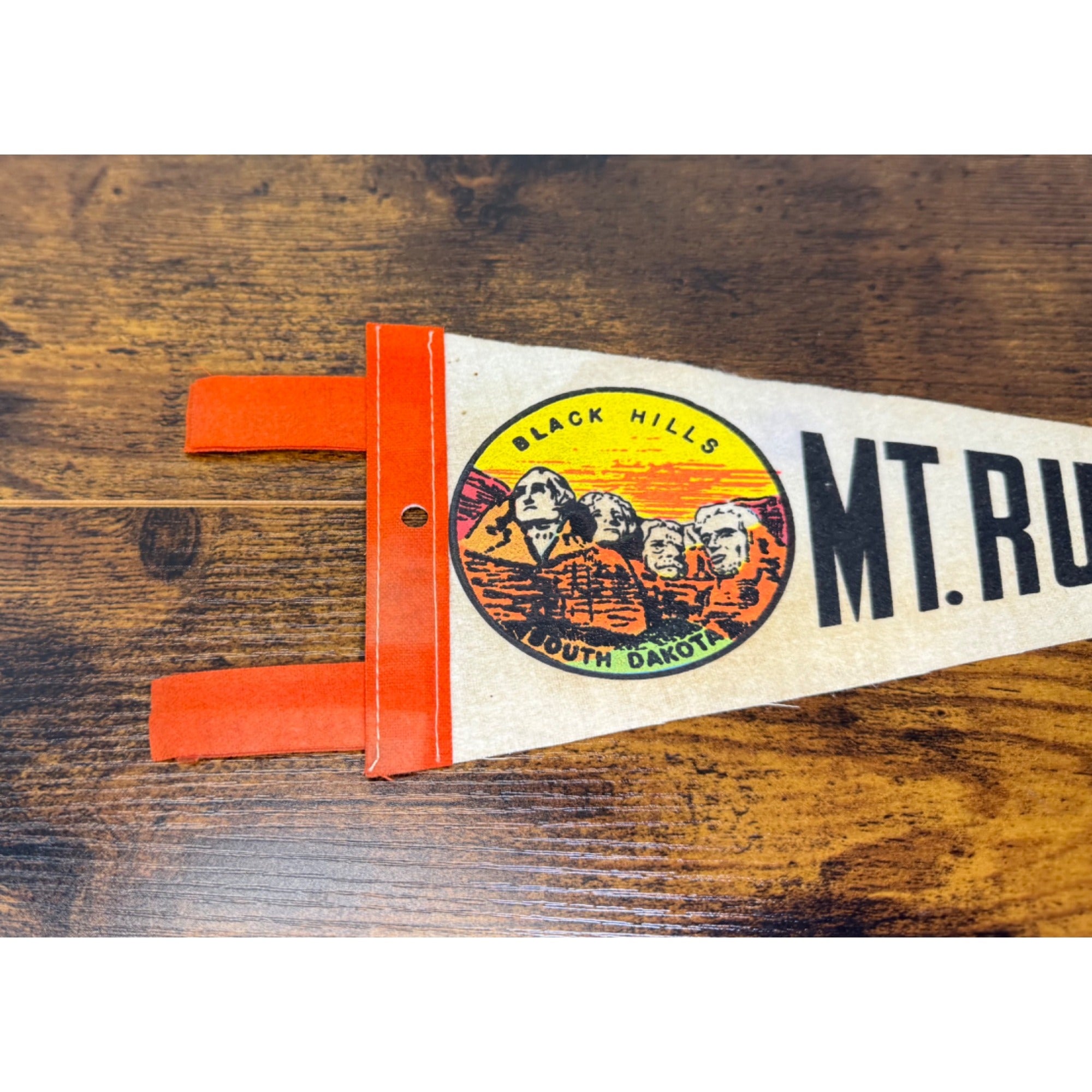 Vintage Mt. Rushmore mini pennant featuring Black Hills, South Dakota