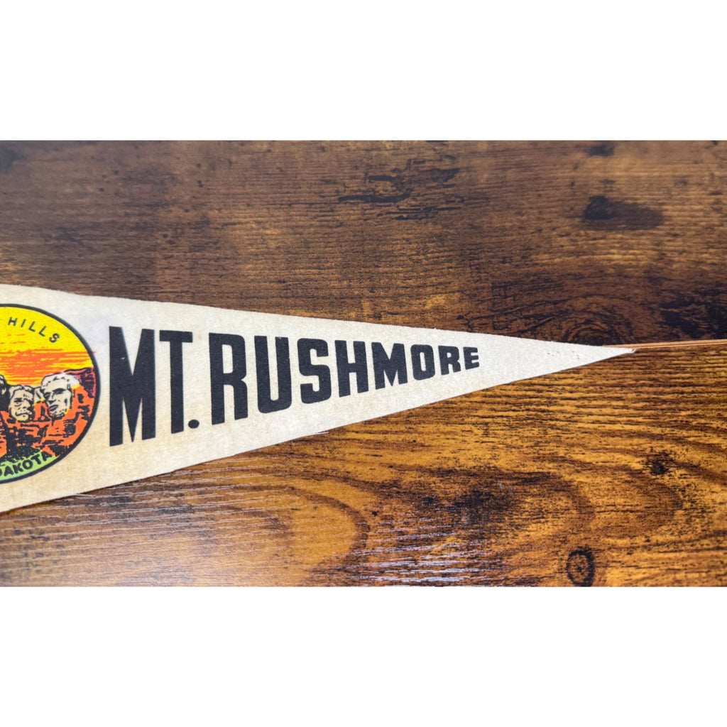 Vintage Mt. Rushmore mini pennant featuring Black Hills, South Dakota