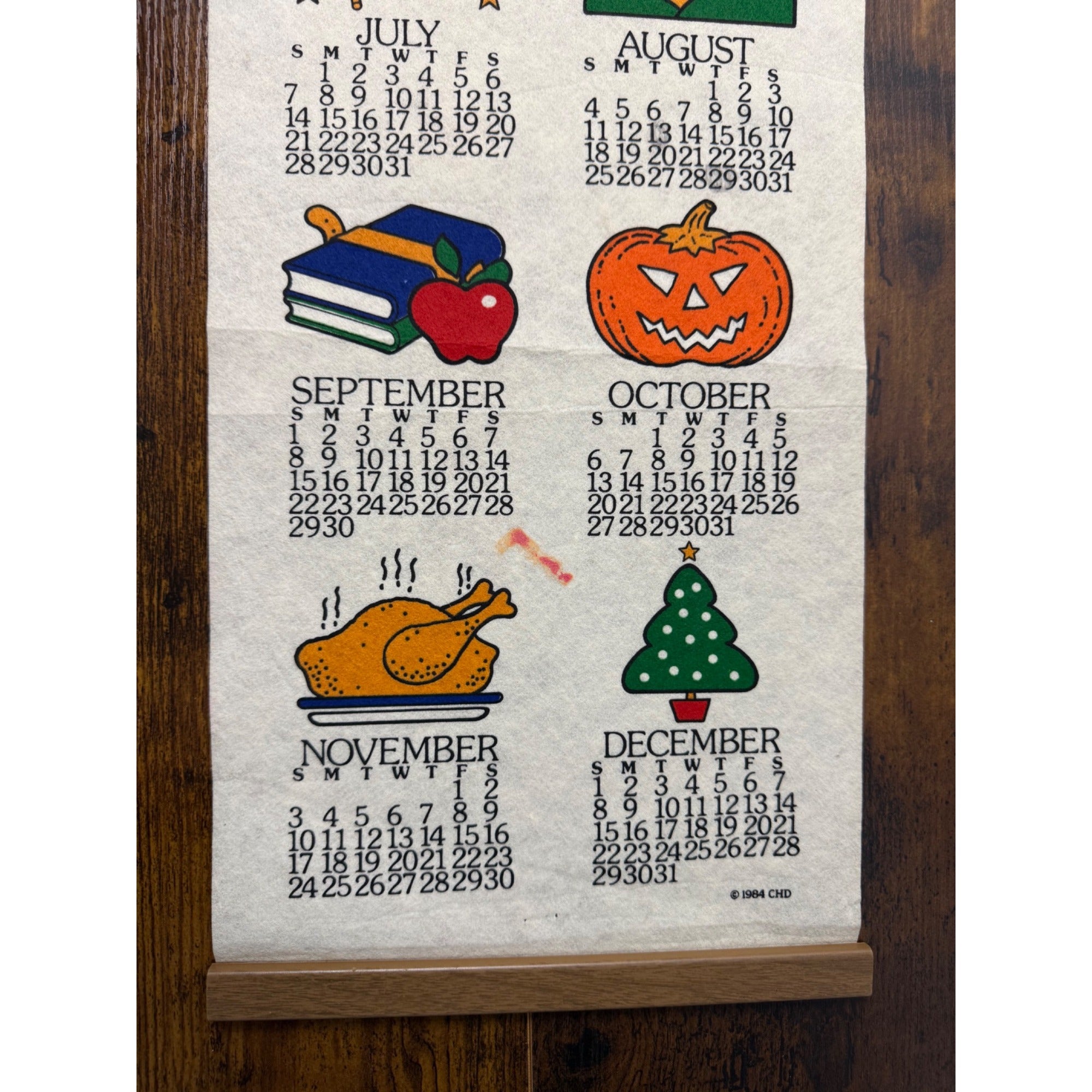 Vintage 1985 Wall Calendar With Seasonal Illustrations & Wooden Hanger
