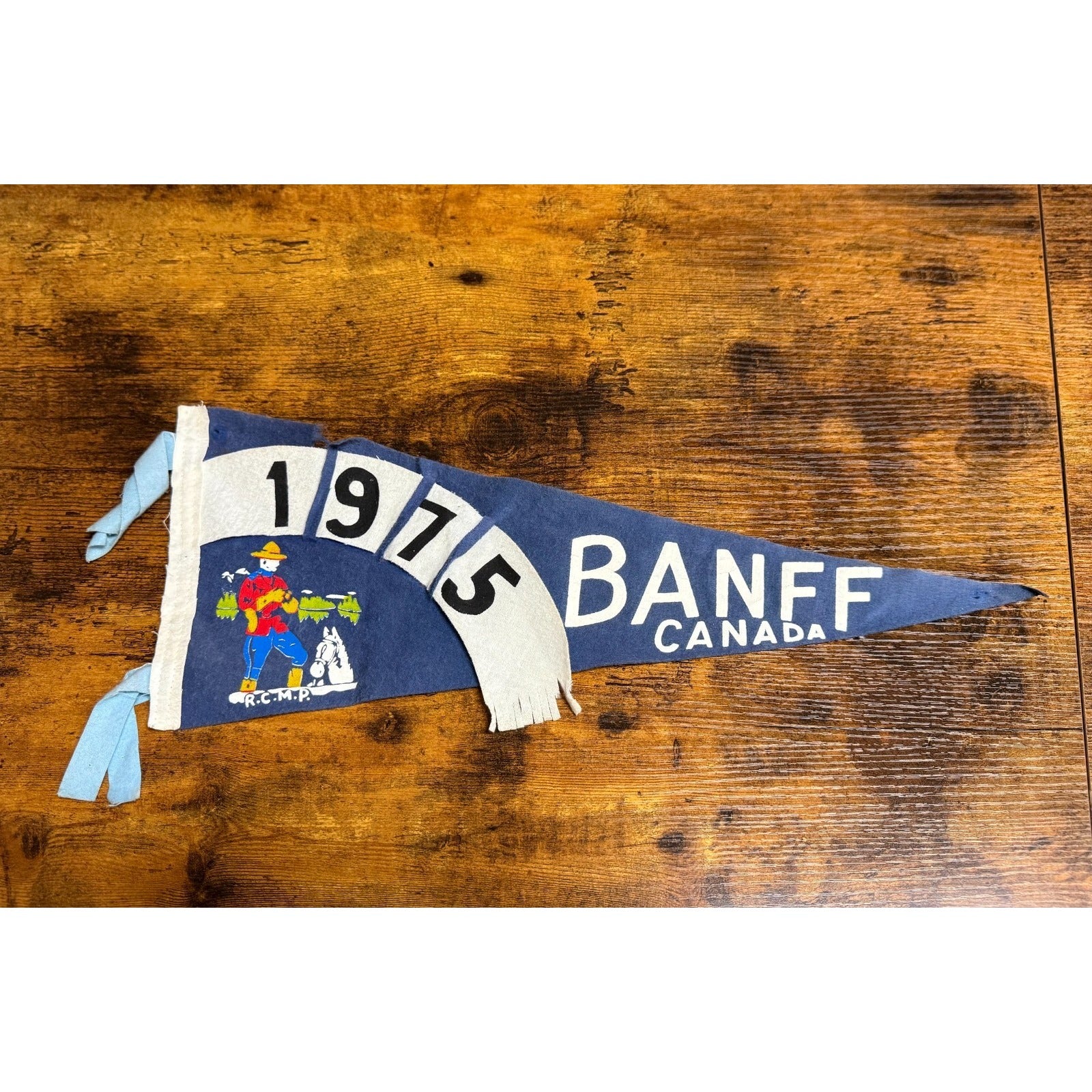 Vintage 1975 Banff Canada pennant damaged