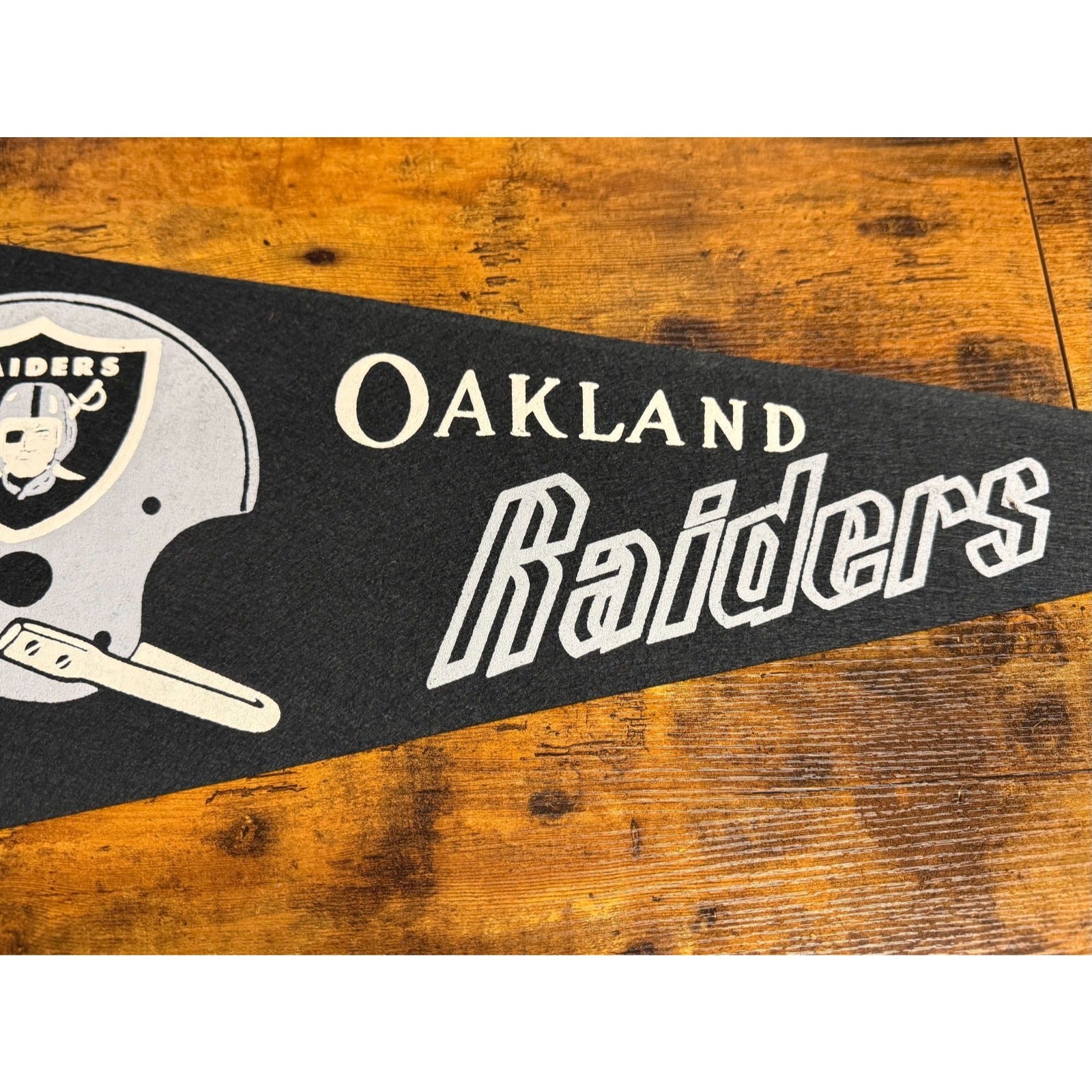 Vintage NFL Oakland Raiders pennant single bar helmet