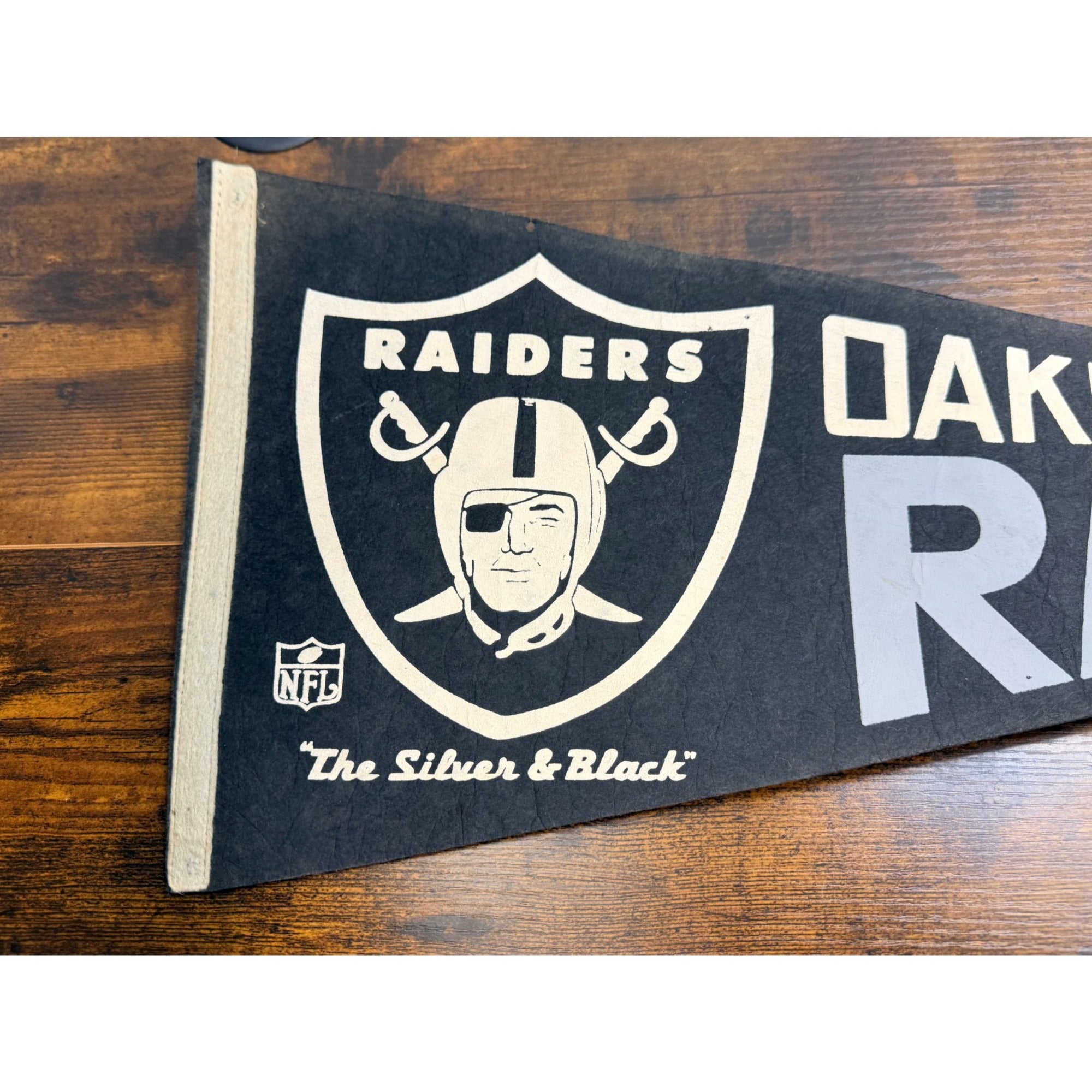Vintage Oakland Raiders NFL Pennant With Logo & "The Silver & Black" Damaged