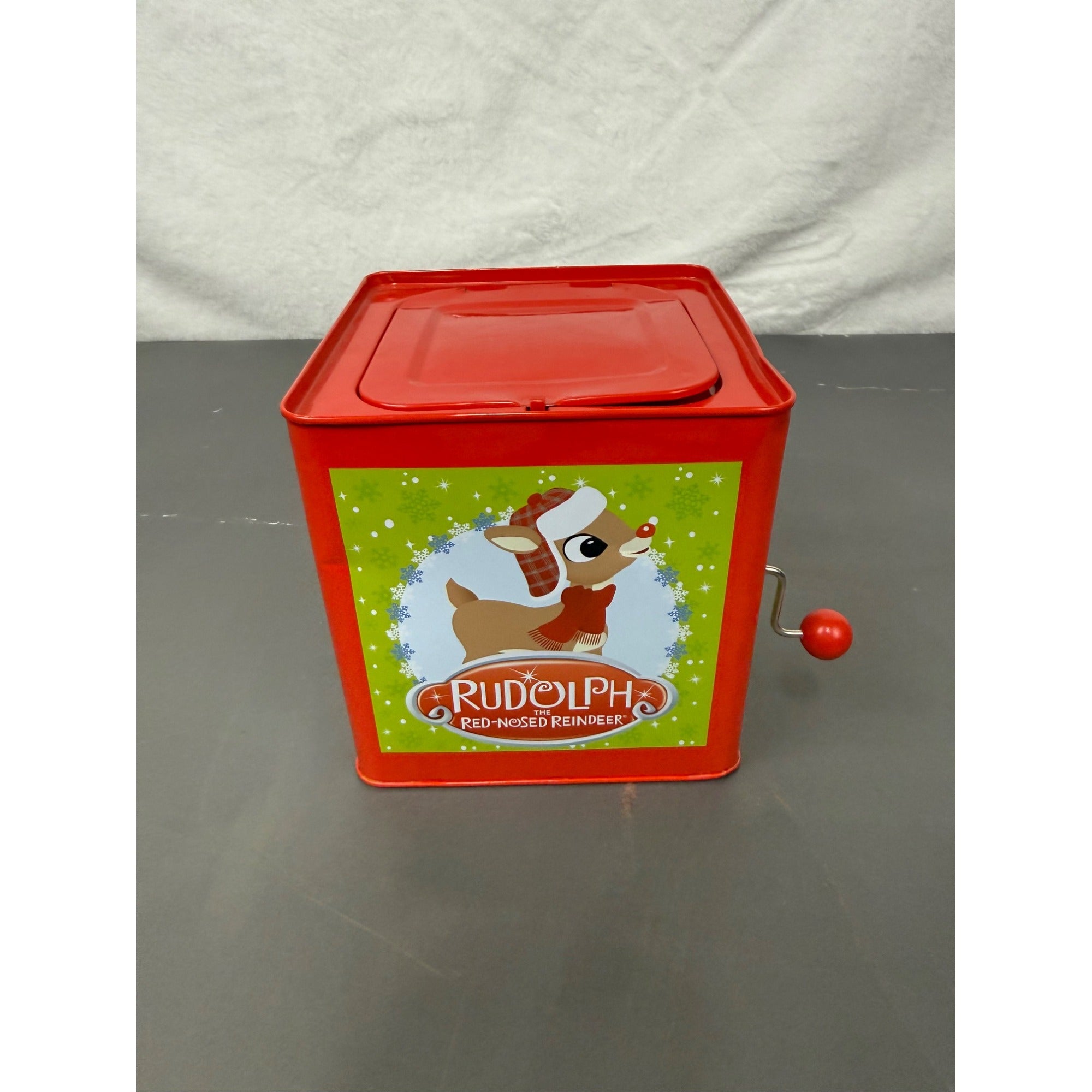 Rudolph The Red-Nosed Reindeer Metal Jack-In-The-Box With Crank Handle & Festive Holiday Graphics