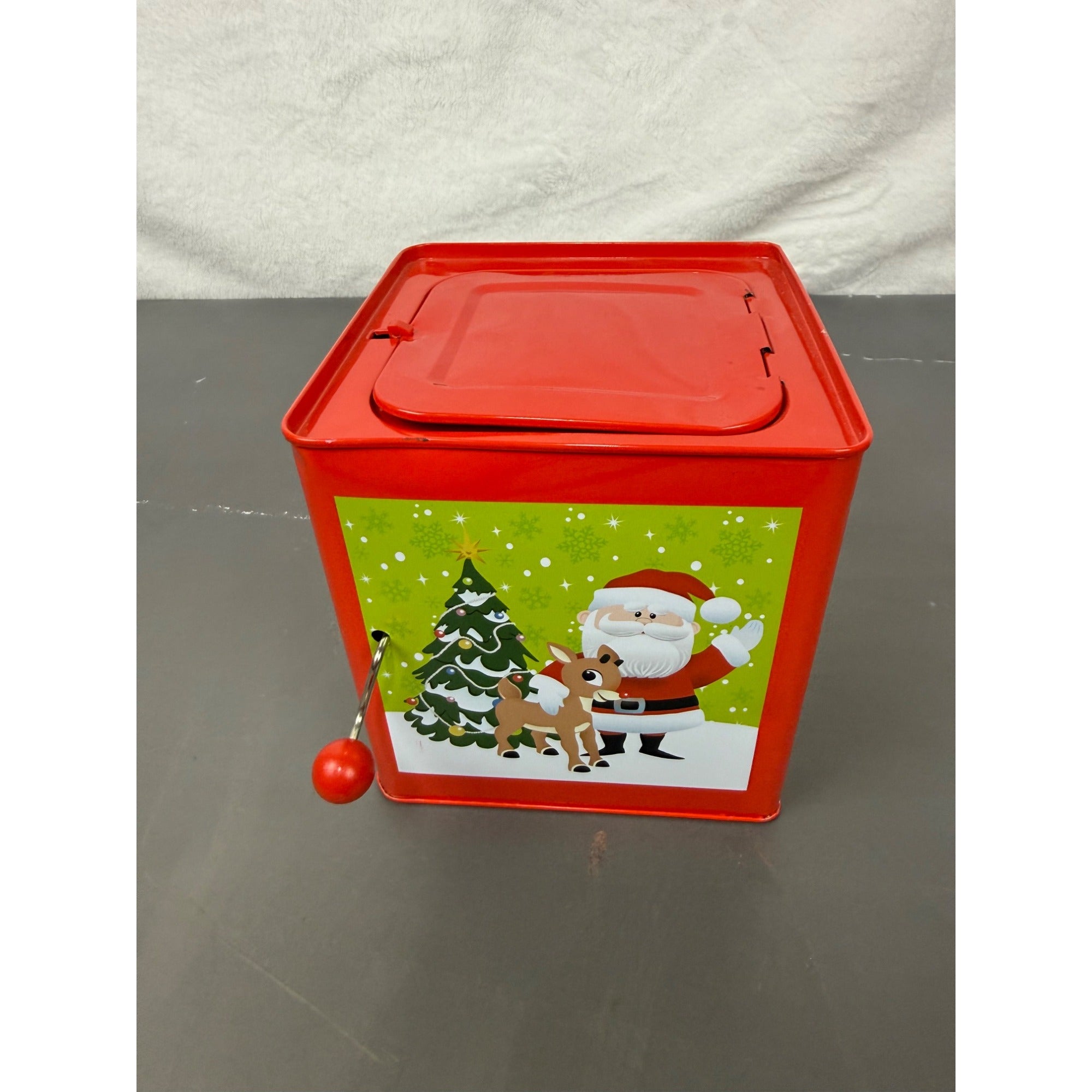 Rudolph The Red-Nosed Reindeer Metal Jack-In-The-Box With Crank Handle & Festive Holiday Graphics