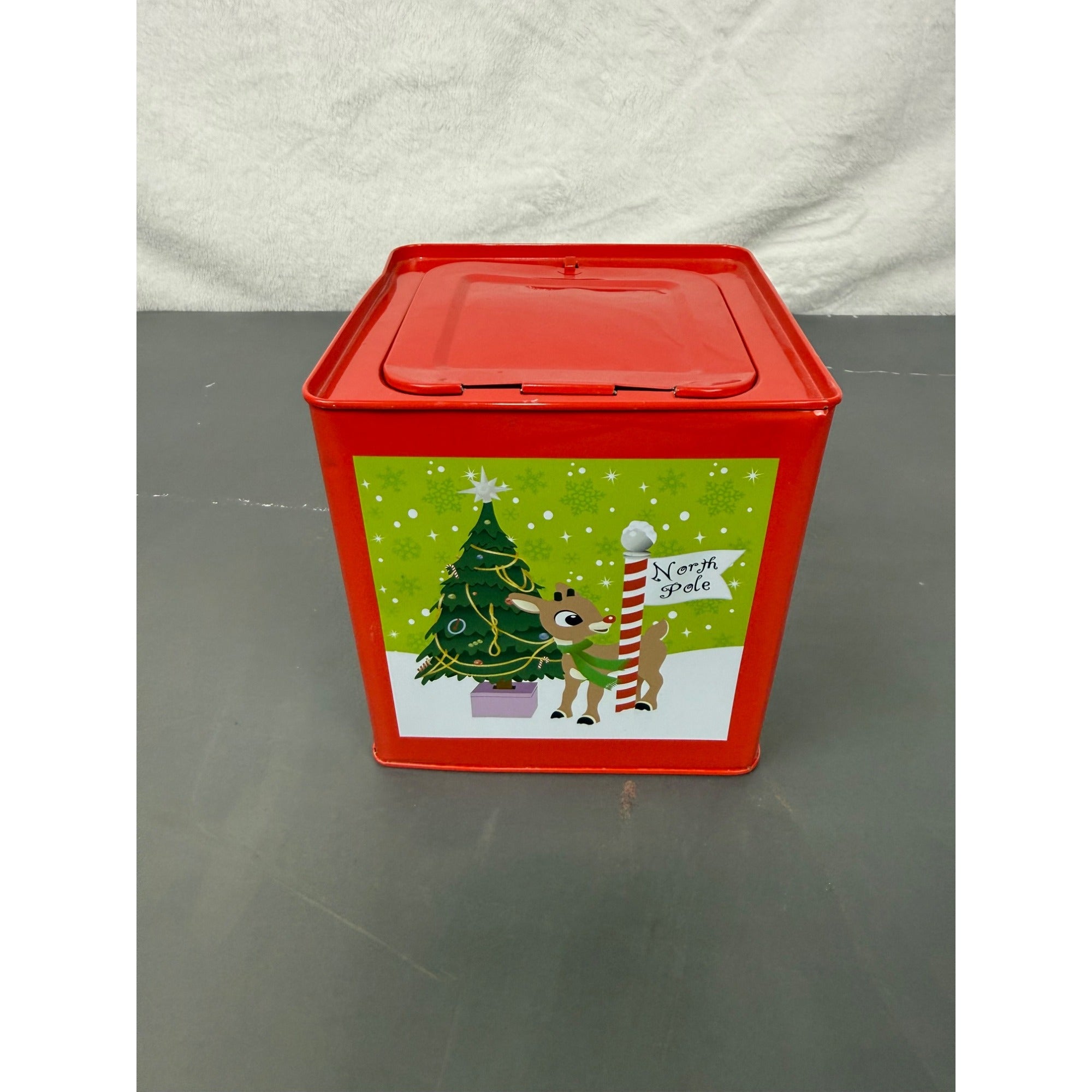 Rudolph The Red-Nosed Reindeer Metal Jack-In-The-Box With Crank Handle & Festive Holiday Graphics