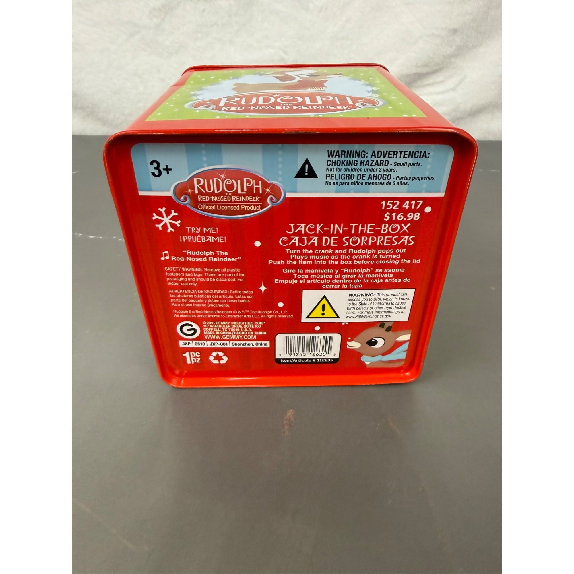 Rudolph The Red-Nosed Reindeer Metal Jack-In-The-Box With Crank Handle & Festive Holiday Graphics