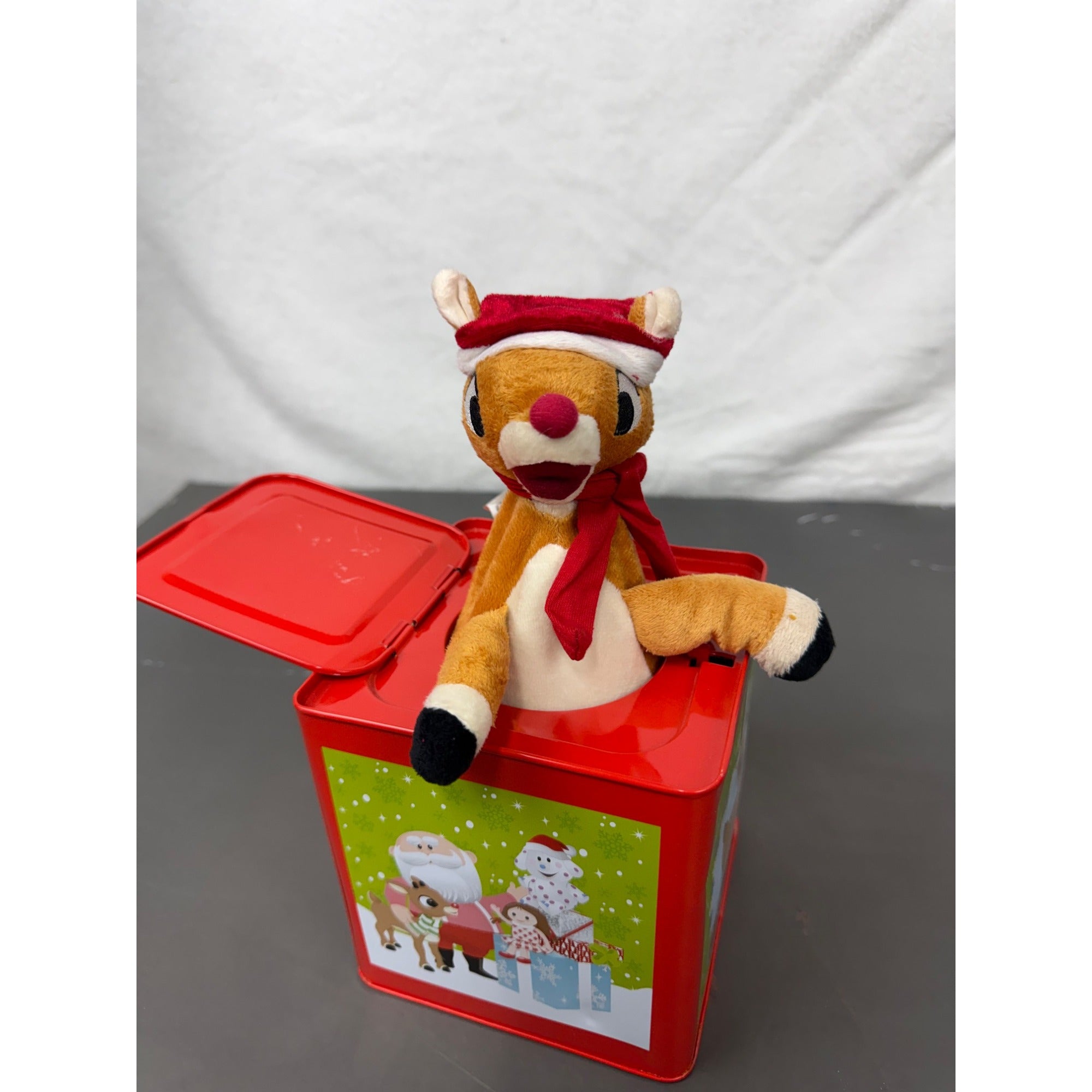 Rudolph The Red-Nosed Reindeer Metal Jack-In-The-Box With Crank Handle & Festive Holiday Graphics