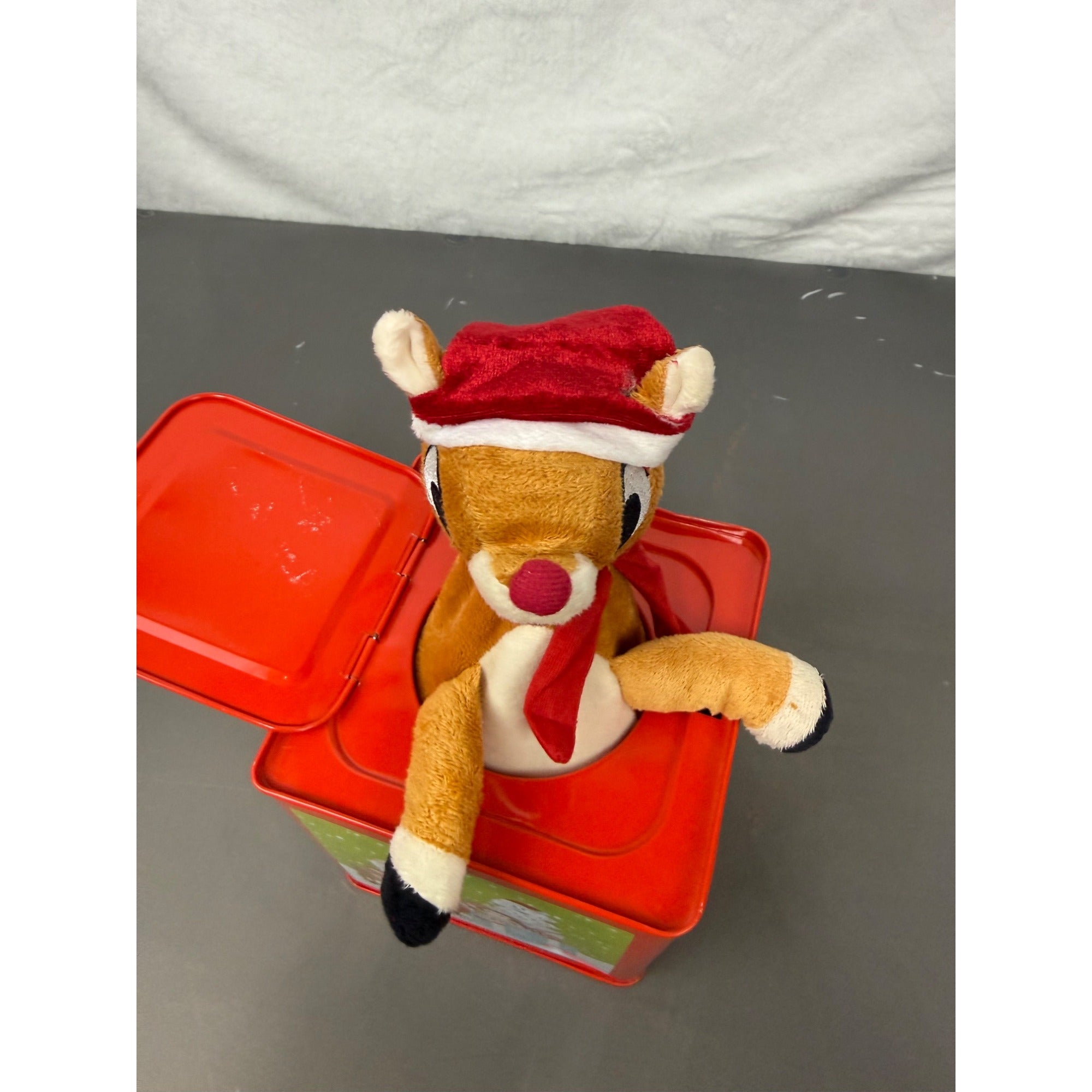 Rudolph The Red-Nosed Reindeer Metal Jack-In-The-Box With Crank Handle & Festive Holiday Graphics