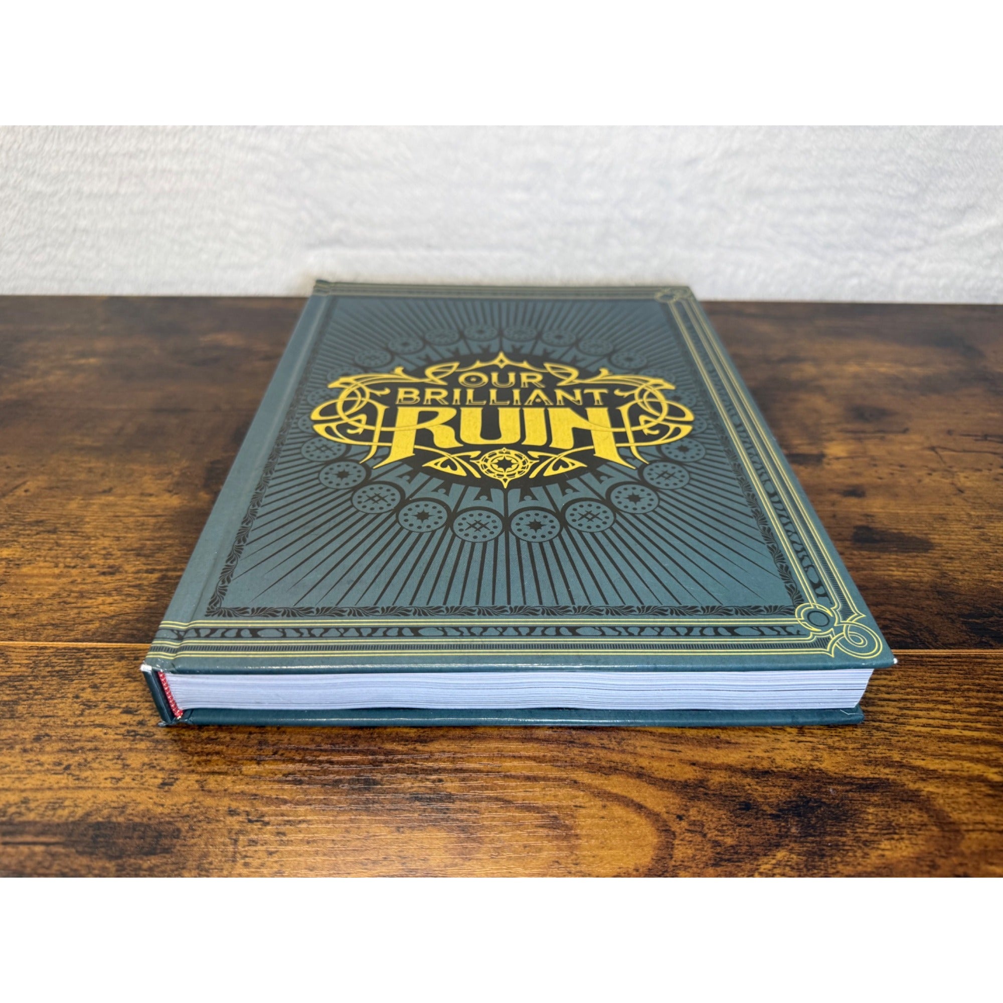 Our Brilliant Ruin Hardcover Book With Ornate Gold Detailing Studio Hermitage
