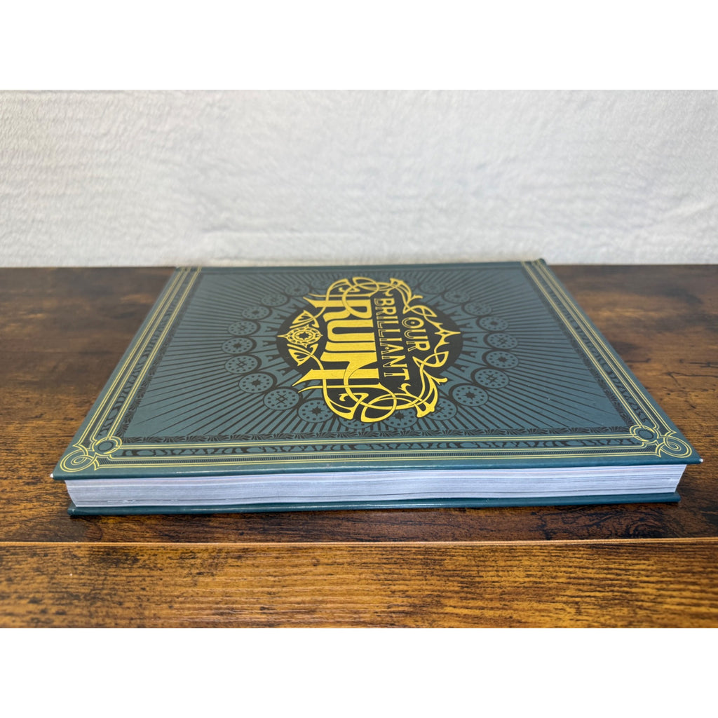 Our Brilliant Ruin Hardcover Book With Ornate Gold Detailing Studio Hermitage