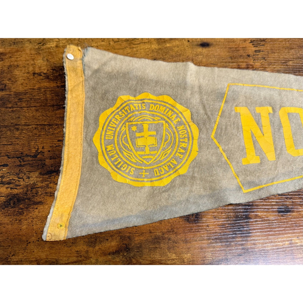 Vintage University of Notre Dame pennant damaged