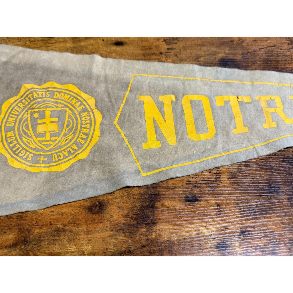 Vintage University of Notre Dame pennant damaged