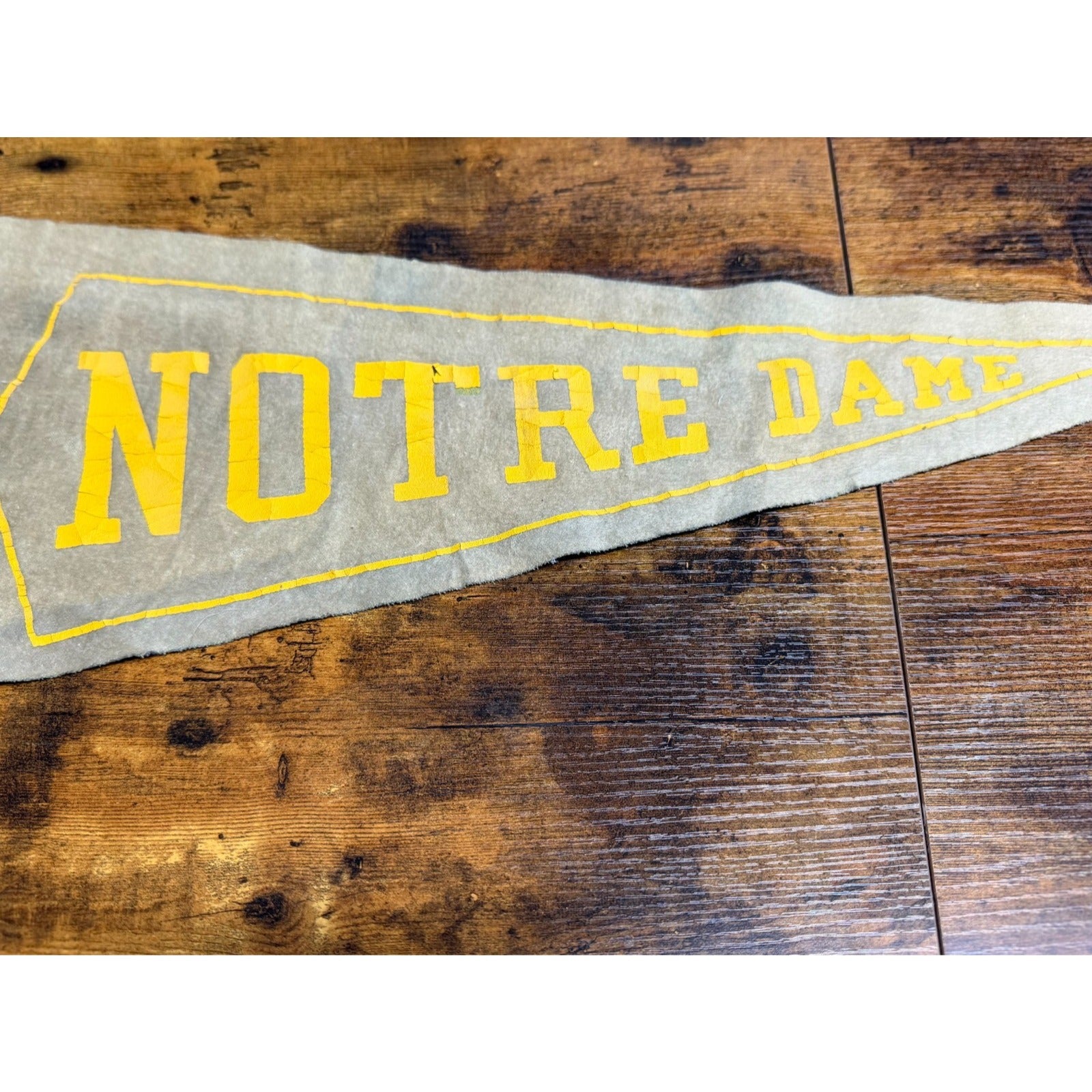 Vintage University of Notre Dame pennant damaged