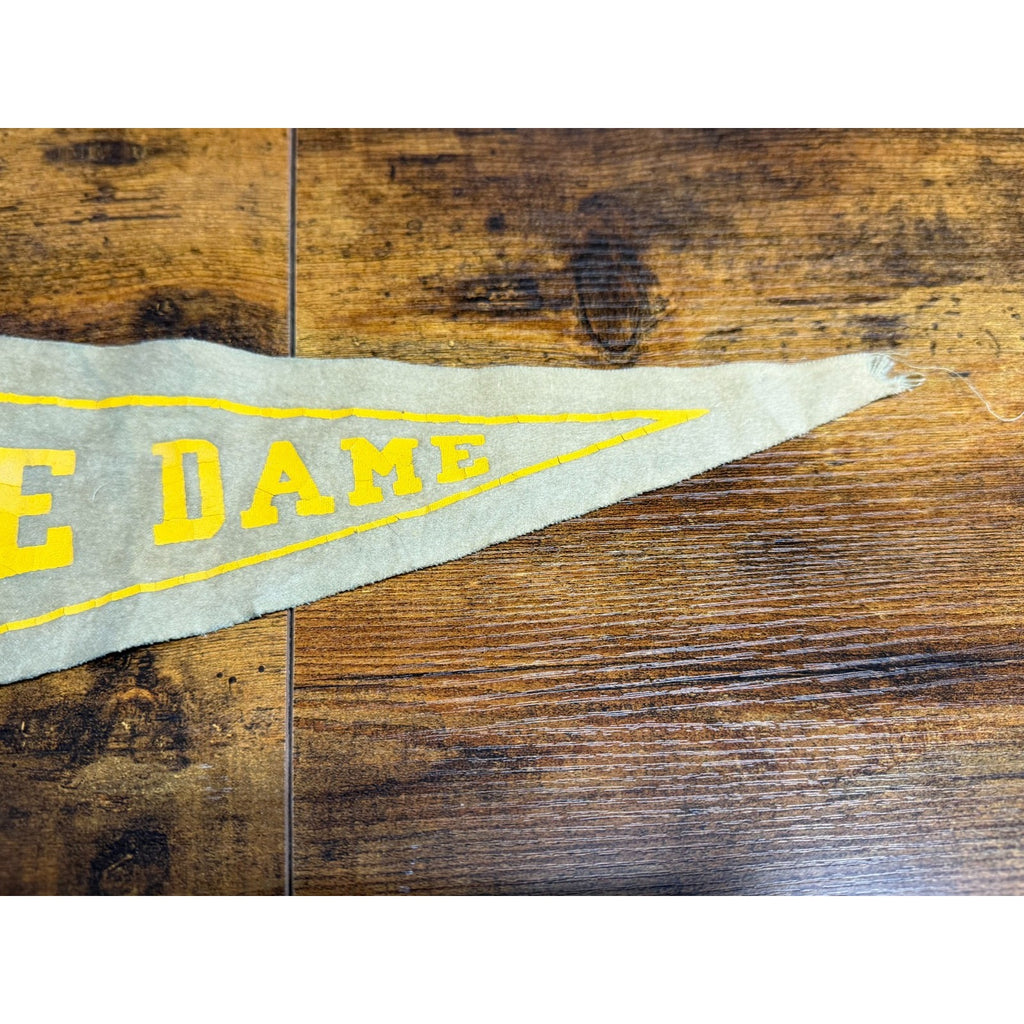 Vintage University of Notre Dame pennant damaged